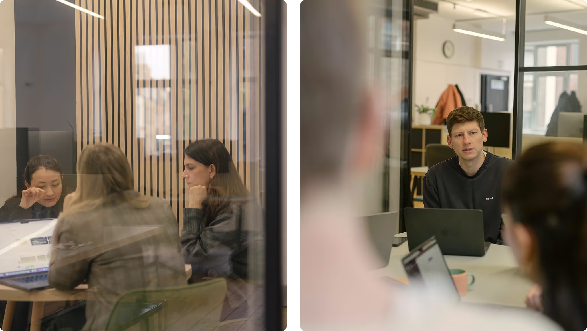 Two meetings seen through glass: colleagues at laptops and a man talking across a table